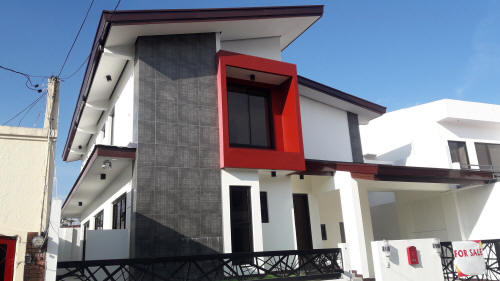 Facade of designer house for sale in BF Homes