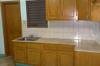 Modular cabinets made of solid wood of townhouse in BF Homes