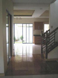 Partial view of kitchen and stairs 