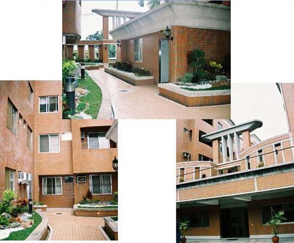 Picture of frontage of Graceland condo, paranaque with pocket gardens.