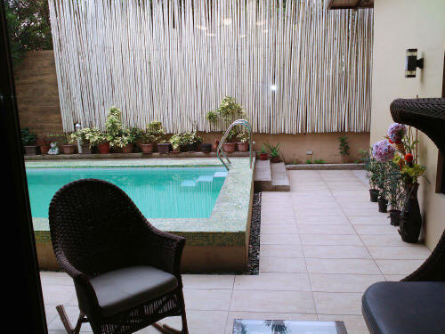 Patio beside swimming pool at BF Homes Executive house for sale