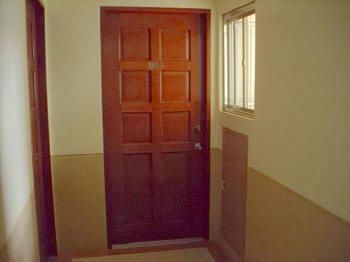 Main door to condo unit for sale