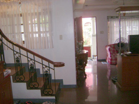 Wooden stairs with iron railing