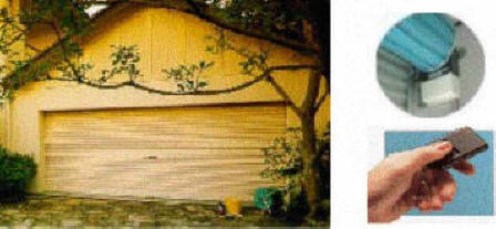 Automatic rolling door with auto reversing mechanism, infrared beam and courtesy light.